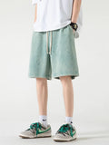Kurze Baumwoll-Sweatshorts im Used-Look für den Sommer