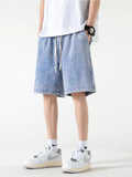 Kurze Baumwoll-Sweatshorts im Used-Look für den Sommer