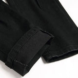 Schwarze Python-Jeans